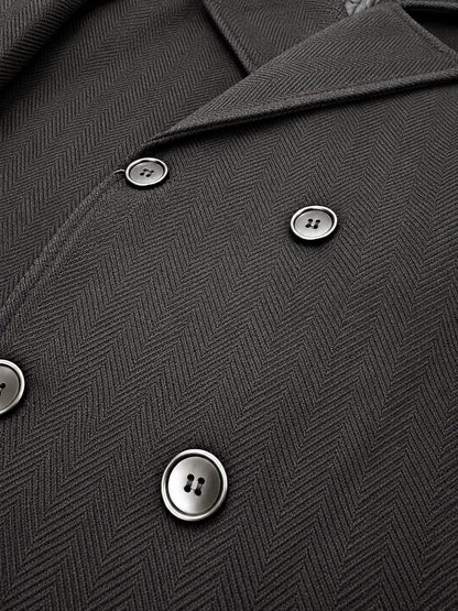 Dark herringbone overcoat fabric and button detail